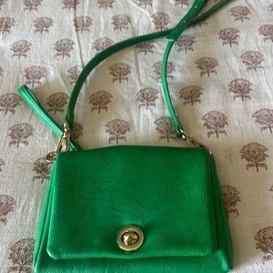 Gently used emerald green Charming Charlie crossover purse. Can also be wristlet